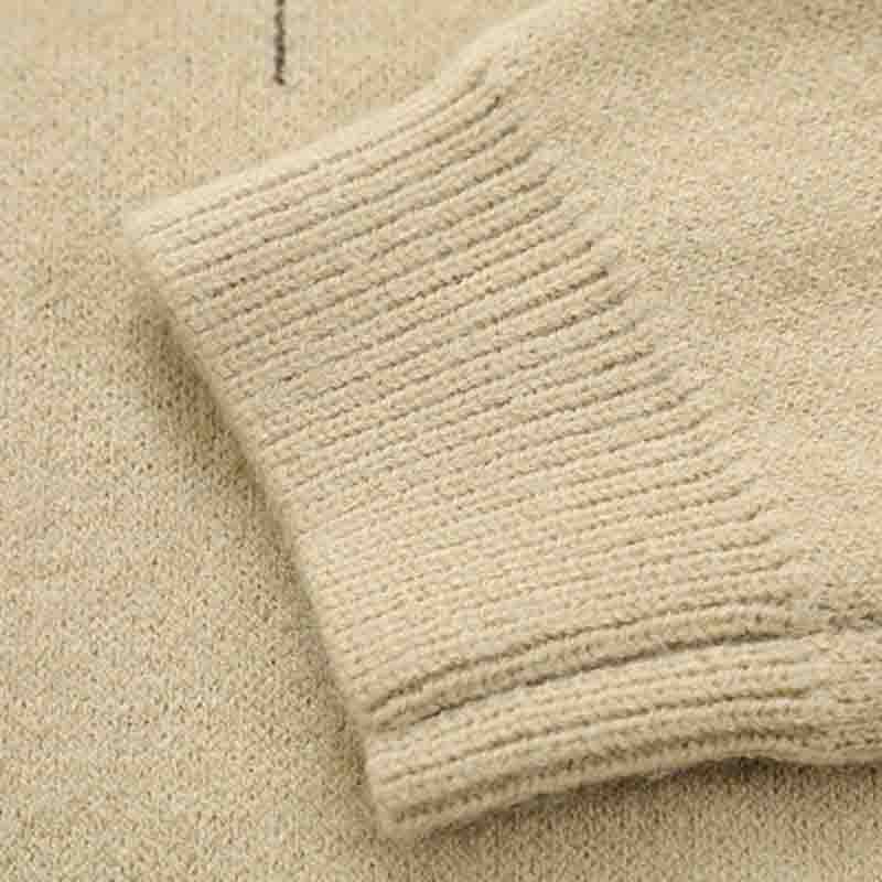 Ungu Sweater